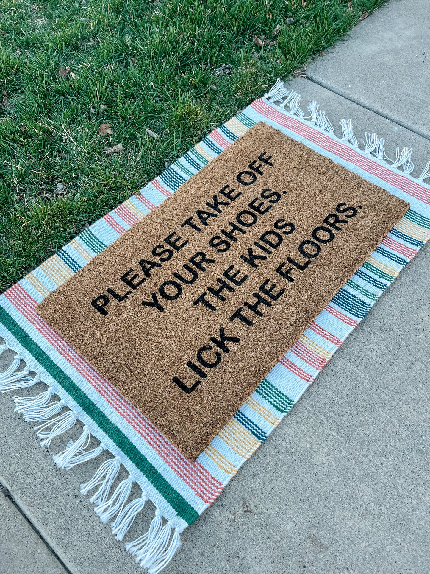 The Kids Lick The Floors Doormat