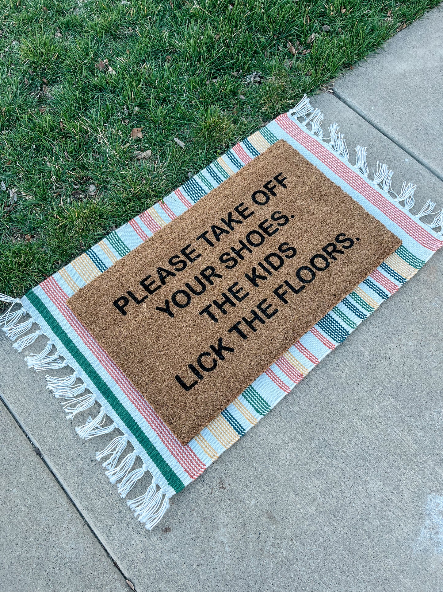 The Kids Lick The Floors Doormat