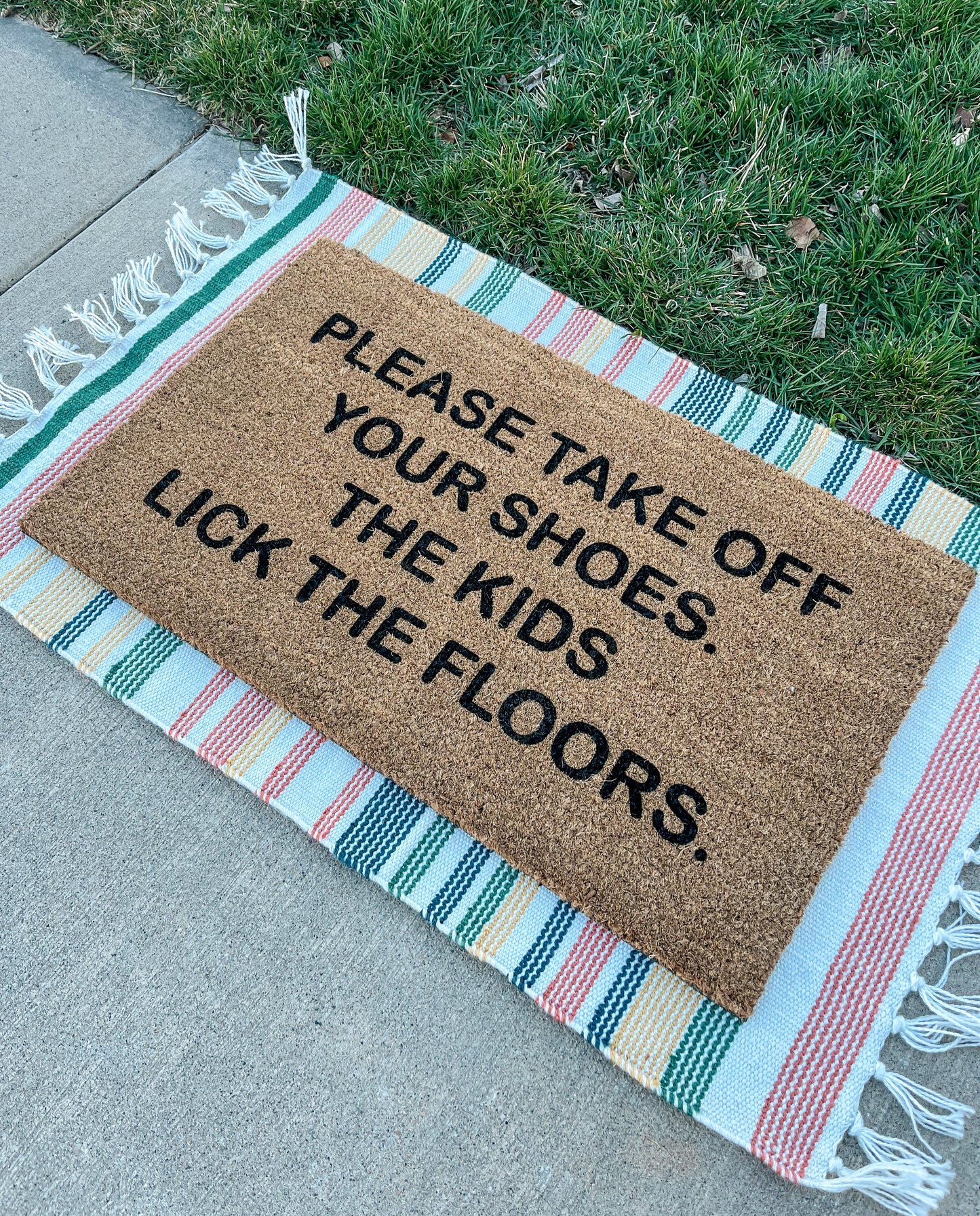 The Kids Lick The Floors Doormat